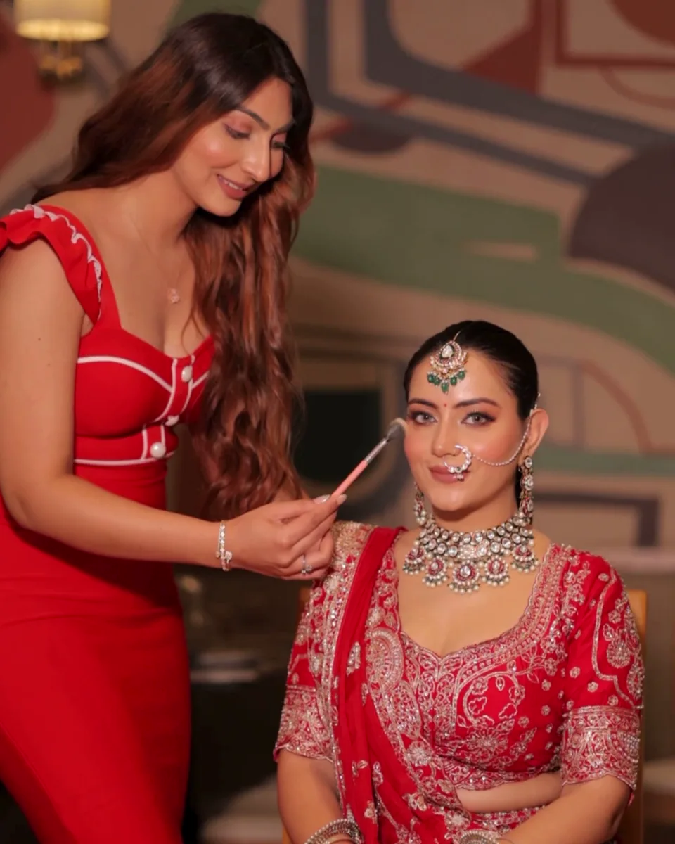 Ekam working on a bridal makeup look